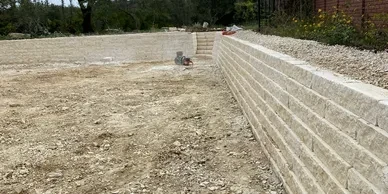 Stone retaining wall backyard